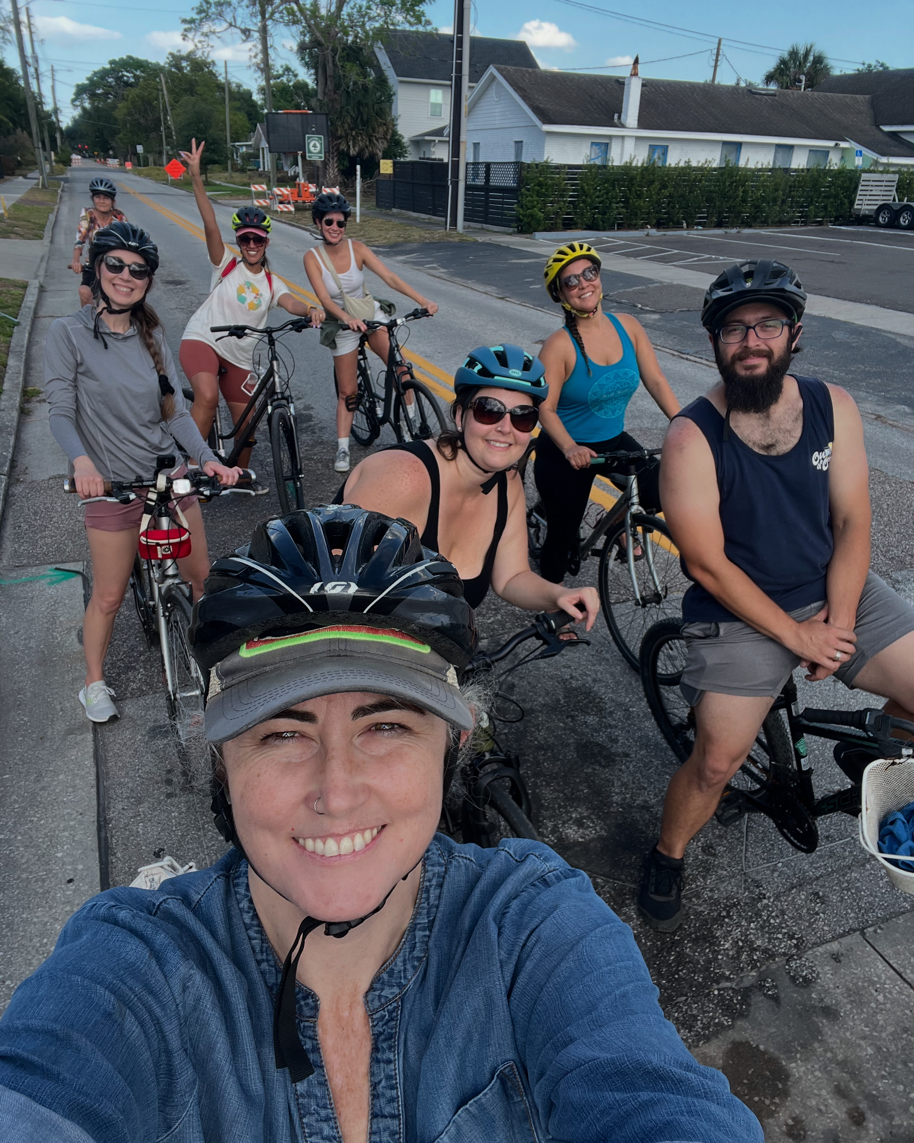 Orlando Bike Tours founder Aubrie taking a selfie with riders during a neighborhood bike tour
